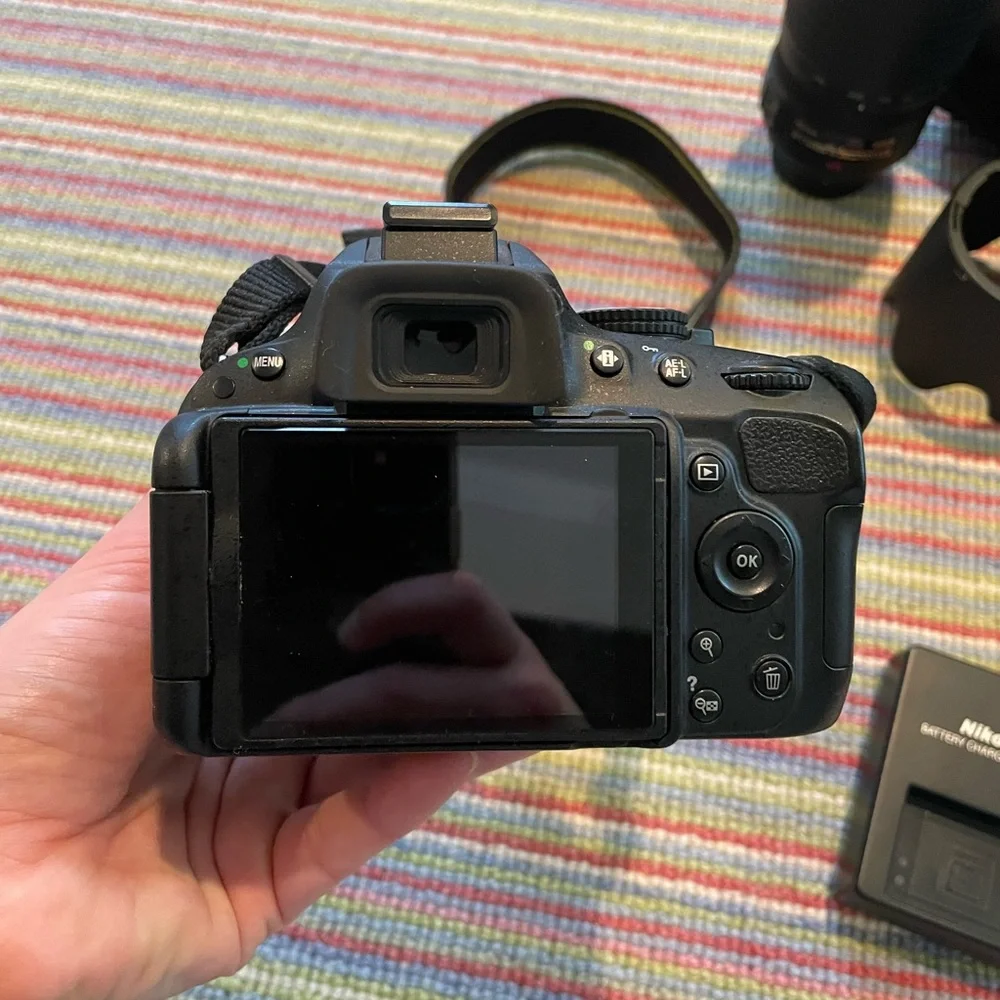 Nikon D5100 w/ standard AF-S Nikkor 18-55mm
